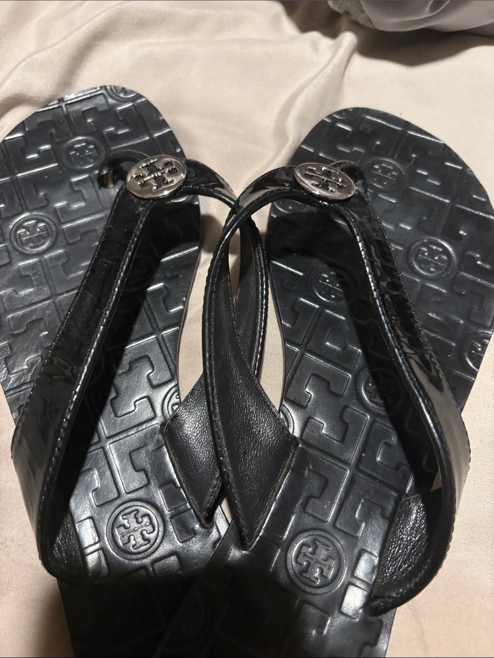 Tory Burch Black Logo-Embossed Patent Flip Flop Sandals with Metal Medallions